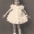 Erika v dětství v době války (tkaničky byly bíle napudrovány, k sehnání byly jen černé)