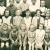 Charlotte Scharfová (sedí druhá zprava dole) v obecné škole v rodných Albrechticích, přelom 40. a 50. let 20. století 