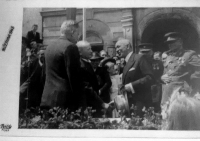 Early post-war days in Písek. President Edvard Beneš greets city representatives and soldiers in front of the Písek town hall.