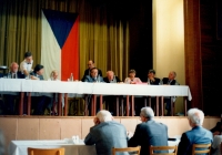 Sylvia Klánová (in pink) in Lidice community centre, reading a letter from Denmark, from the first donor who contributed to casting the bronze sculpture (1992)
