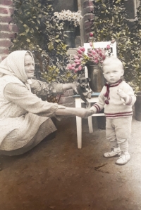 With his grandmother 