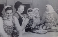 Marie doing her favorite activity - cooking. Woman on the left, baking cakes, 60s
