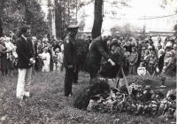 Wreath laying ceremony in the presence of the U.S. ambassador at the grave of an American pilot, Kateřina in chequered dress, Lipník nad Bečvou, 1987