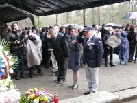 Memorial ceremony in Sagan. From the left, Karel Bryks, representing colonel Josef Briks, a tough boy with a sensitive soul who would escape from many a war prison camp, whose health was ruined by the Communist regime and forced labour in the Jáchymov uranium mines. WHat was the last straw that broke his heart was a ban on corresponding with his beloved English wife. Iveta Irvingová is representing V. Bufka and Václav Toman, the head of the Jan R. Irving Airforce History Club in Plzeň. He chose to join the party when Ivanka Škarvadová politely chose not to go to the strong rain and cold weather and remained in the VIP tent.