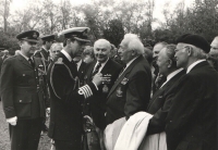 Another beautiful snapshot from a memorial ceremony at the Olšany cemetery. Behind Prince of Wales's back, a part of Jiří Maňák's face is showing, Jan Irving is smiling at one of his best friends, "tough guy" Bohumil Jaroš aka "Suchar" [~dry wit], at whose left, with a coat over his hands, colonel Malý is standing; on his right, wearing a beret, colonel Petr Uruba. Along with Zdeněk Škarvada, Vilda Bufka and others, they were imprisoned at the Sagan camp and later, they were moved to the famous German castle where officers were imprisoned, Coldwitz, and they shared the cells there.