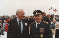 The photograph shows colonel Josef Šnajdr (United Kingdom), one of the former commanders of the No. 311. Squadron, in a lively debate with colonel Irving. He was a strict but fair commander who was respected by everyone. Now, after that many years, they chatted like old friend regardless of the former rank.