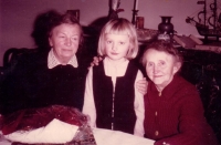 Eva with grandmothers. From left grandmother Fišer, from right grandmother Vorlíček / Christmas 1969