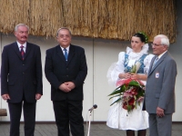 Strážnice International Folklore Festival, Josef Jančář is accepting the Award of the Ministry of Culture. 
From the right: Josef Jančář, Jan Krist (director of the National Institute of Folk Culture ), Přemysl Sobotka (chairman of the Senate). 2008 
