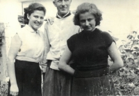 With sister Věra and father