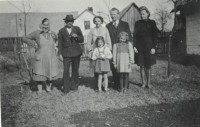 Six-year-old Marie Krásová with her family