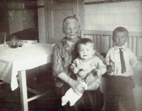 With brother Jiří and grandmother Janovská in 1931.