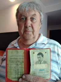 With his ID from communist Czechoslovakia
