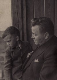 With his father