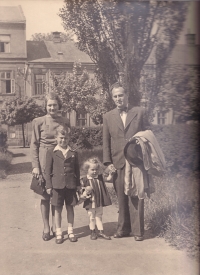 The parents, Cyril and Marie Skopals, Jaroslav and the sister Dagmar at the Svoboda square in Přerov in 1944