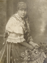 Mother Marie as a seventeen-year-old in a costume she embroidered herself; 1918
