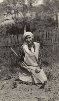Her grandmother Rela works in the garden, Hleďsebe, 1958
