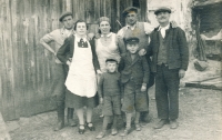 From the left: Václav Kiršner, Milada Kiršnerová, employees of the butchery, grandad Ludvík Beránek, in the front from left Jaroslav and Mirek Beráneks