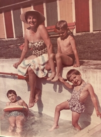 with her husband and three children