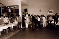 St. Nicholas Day celebration being held at the 'Na Kotli' hall of residence, photo by Miloš Hofman; November 1989 
