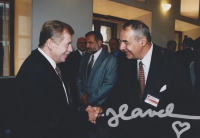 In a conversation with the President of the Czech Republic, Václav Havel, at the Plečnik's vestibule of Prague Castle during the Prague - Vienna Ball opening, 1994