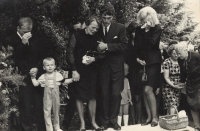 Antonie Zářecká in her son Vladimír's arms at her husband's funeral, 1970