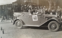 Father Felix Rotter at the car races in Rožnov