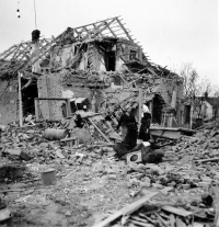 Witness' grandmother, Antonie Barborková and aunt, Milada Löschová in the ruins of their house in April 1945