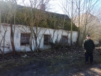 Josef Trpák in front of the windows of the run-down house in Cetule where their family was involuntarily moved to in 1950. Picture: RŠ, March 2020