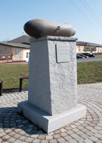Remnants of unexploded defused explosive aerial bomb AN - M64 General Purpose 500 pounds placed on top of a memorial to Explosive Ordnance Disposal personnel in Jateční Street near the Plzeň marshalling yard