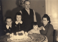 With her parents and older sisters in law, circa 1941