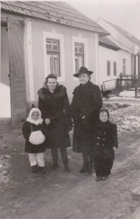 With mother, sister and family acquaintance 