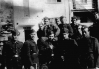 The artillerymen - Bedřich Kyselka first on the right in the second row; Josef Dlouhý first on the left in the first row; Václav Zápotocký second on the right  in the first row; Russian driver Voloďa Děrjábin sitting supporting his chin; and unidentified; Liptovský Hrádek, 1945
