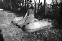 Karol Steklý sits on unexploded mines, Slovak soldiers destroyed ammunition after the war, which remained on the ground after the fights
