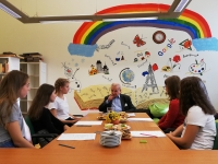Pupils of Bohumil Hrabal Primary School with Mr. Mensdorff-Pouilly during the recording of his story within the Stories of Our Neighbours project.