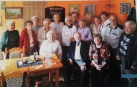Class meeting after 65 years, Emilie Škábová is fourth in the top row from the left, 2015
