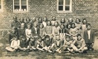 At an elementary school in Nejdek, Ladislav third from the right, sitting, 1948