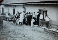 The family next to house nr. 24 in Chrastice