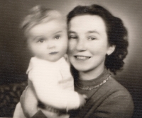 His wife Jana Tazlárová with their child, 1955