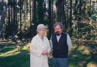 With his partner Marta Hlavsová at the memorial linden trees planted on Rajská louka near Boskovice, 2002 

