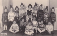 Another performance of Brod Girl Scouts. Blond girl Věrka in the bottom row third from the right on a chair