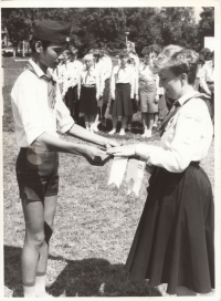 Tying a scarf at the International Peace Camp, Seč, 1987