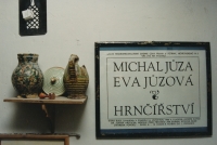 Invitation to an exhibition of Eva and Michal Jůza's stoneware.