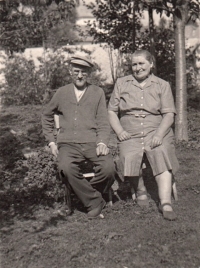 His grandfather, Průša, with his grandmother
