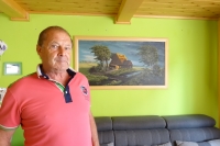 Ľudovít and in the background a painting, which was painted by his mother Mária Volfová