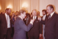 Alexandr Neuman (far left, with "burning" head) at the meeting of Václav Havel and Alexander Dubček (centre).