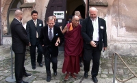 Walk from the church of St. Anne to the  Na zábradlí  theatre [Theatre on the Balustrade] during the Dalai Lama's visit to Prague in 2009.  Alexandr Neuman on far right. Still from a document by Peter Jančárek.