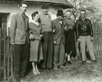 Albín Huschka at the far left, with his family and friends after the war 