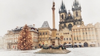 Image of the Marian Column in December 2020, when the first snow of the year covered the Old Town Square