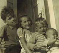 Ruth Kolínská with her older siblings at the rectory in Horní Krupa, 1953