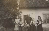 Anna Poláková (second from the left) with the local priest